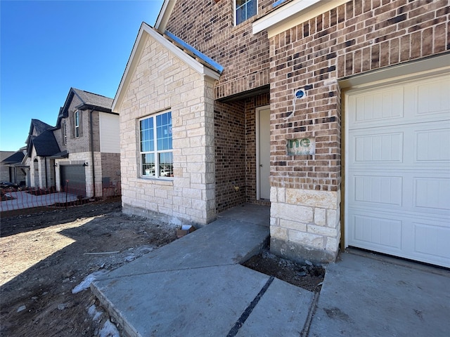 property entrance featuring a garage