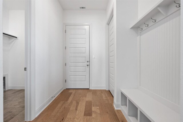 7501 Becasseau Dr, Austin, TX 78738 - mudroom with light wood-style flooring and baseboards