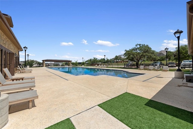 7501 Becasseau Dr, Austin, TX 78738 - community pool featuring a patio area