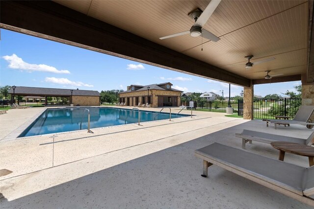 7501 Becasseau Dr, Austin, TX 78738 - community pool with a patio and a ceiling fan