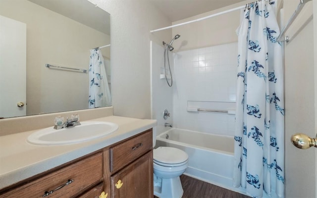 full bathroom with vanity, shower / bath combination with curtain, toilet, and wood-type flooring