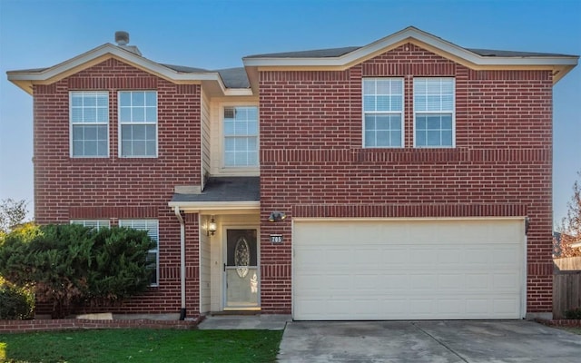 view of front of property with a garage