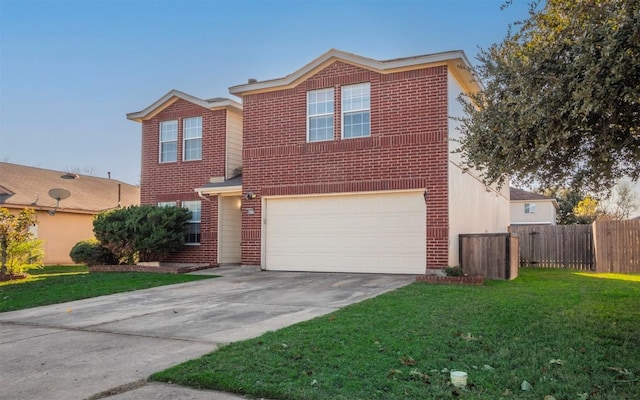 front facade featuring a front yard and a garage