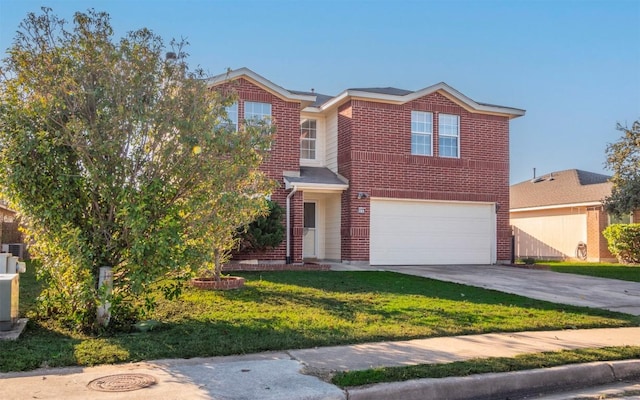 view of front property with a garage and a front lawn