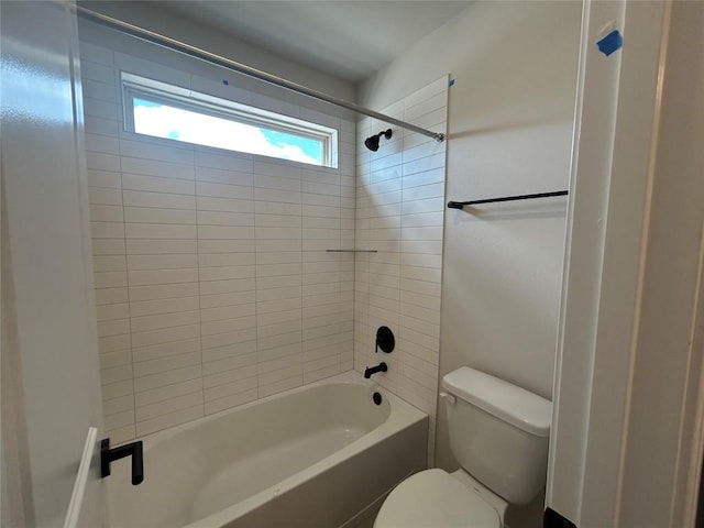 bathroom featuring toilet and shower / bath combination