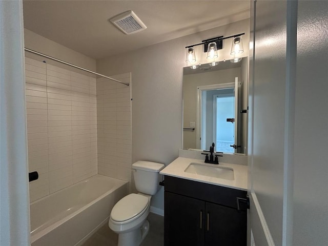 bathroom with baseboards, visible vents, toilet, bathtub / shower combination, and vanity