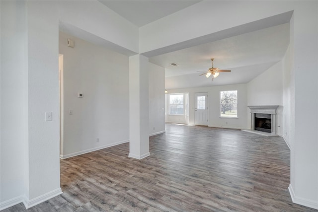 unfurnished living room with light hardwood / wood-style flooring and ceiling fan