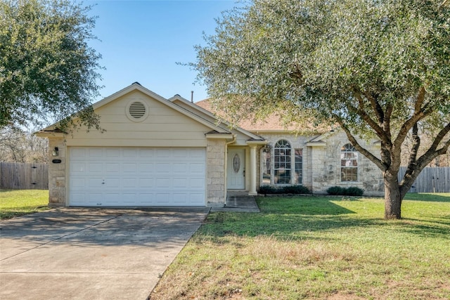 single story home featuring a garage and a front yard