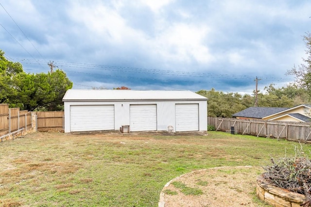 garage with a yard