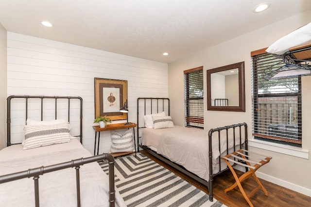 bedroom with wood-type flooring