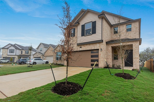 view of front of house with a front lawn and a garage