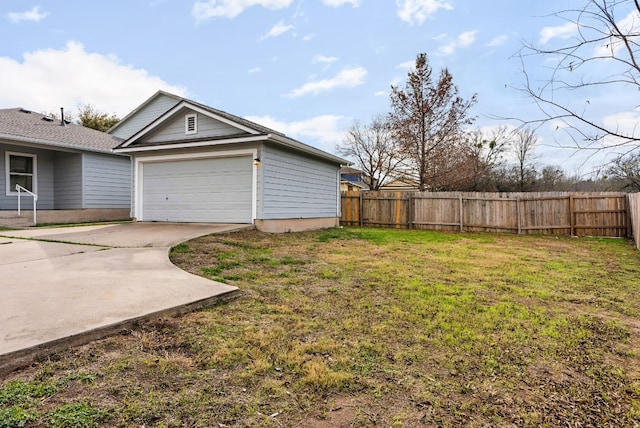 view of yard featuring a garage