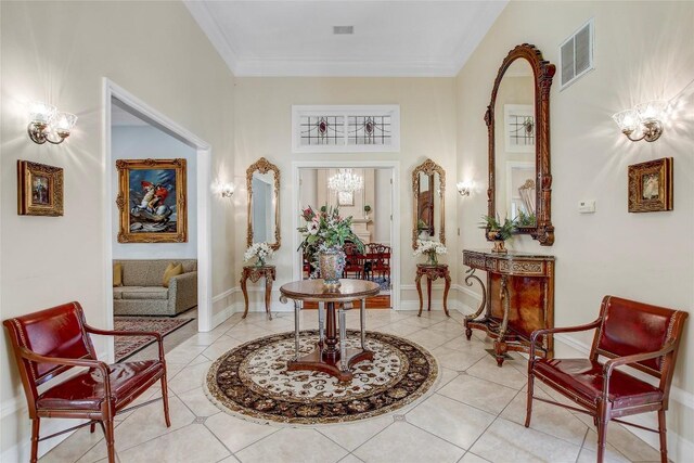 13628 Gregg Manor Rd, Manor, TX 78653 - living area with crown molding, baseboards, and light tile patterned floors