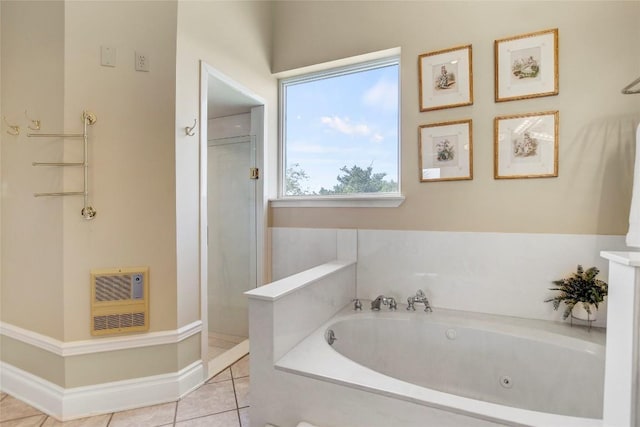 13628 Gregg Manor Rd, Manor, TX 78653 - full bath featuring heating unit, a tub with jets, tile patterned flooring, and a shower