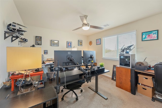 home office with ceiling fan and carpet floors