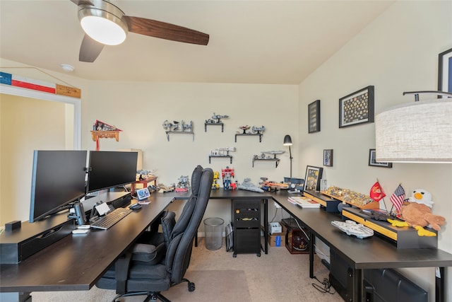 office space featuring ceiling fan and light colored carpet