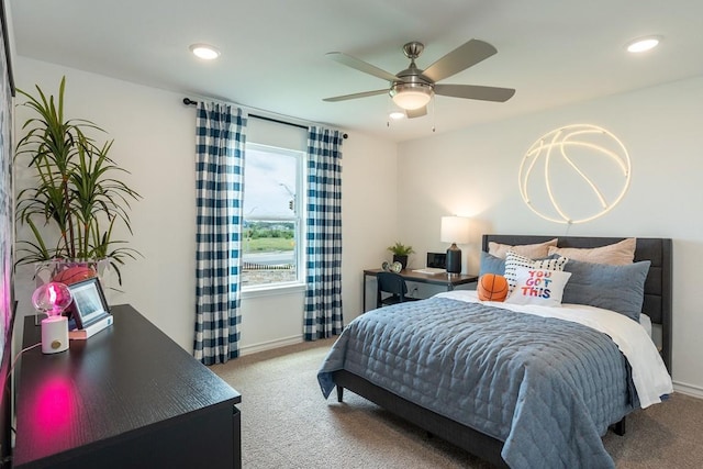 bedroom with ceiling fan and carpet floors