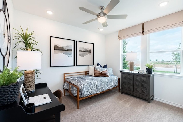 carpeted bedroom with ceiling fan