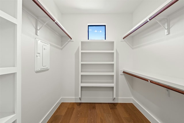 walk in closet featuring hardwood / wood-style flooring