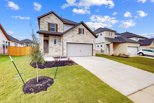 view of front of home featuring a front yard and a garage