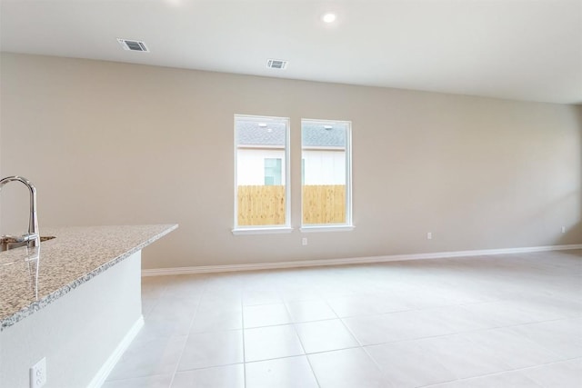 interior space with light tile patterned floors