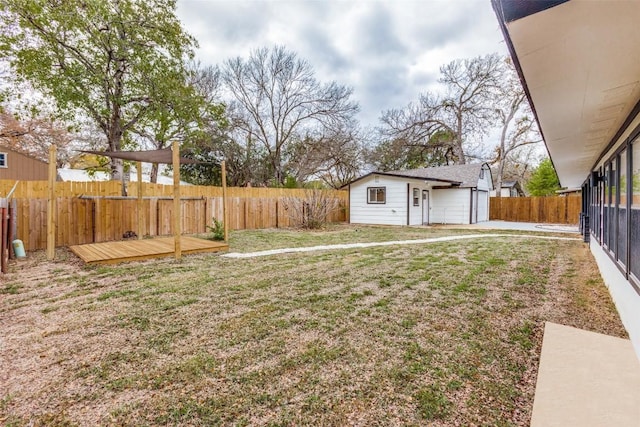 view of yard featuring a deck