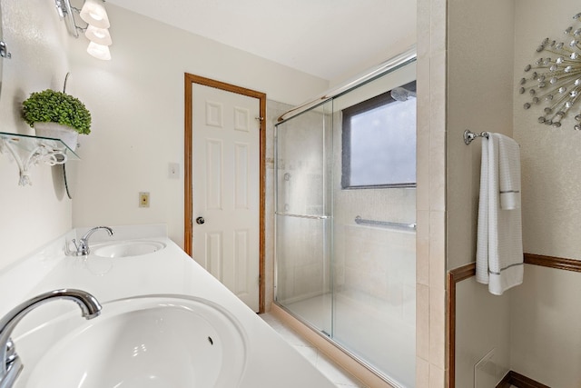 bathroom featuring vanity and walk in shower