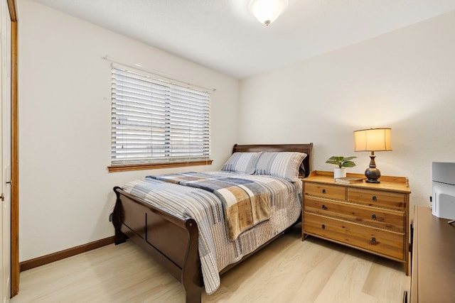 bedroom featuring light wood-type flooring