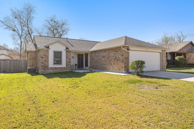 ranch-style house featuring central AC, a front lawn, and a garage