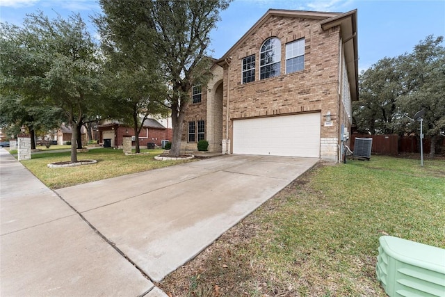 view of front of property with a front yard and a garage