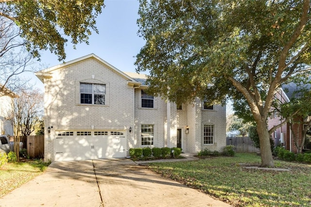 view of front of home with a garage and a front lawn