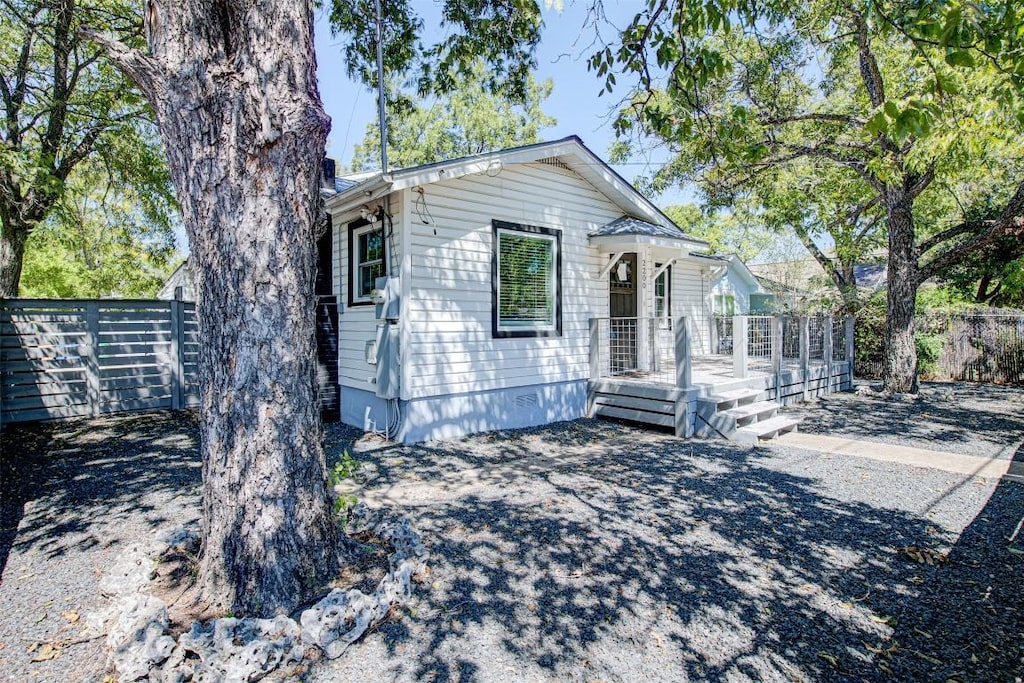 view of front of house with a wooden deck