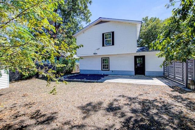 back of property featuring a patio area