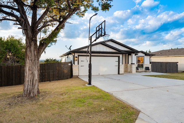 exterior space with a yard and a garage