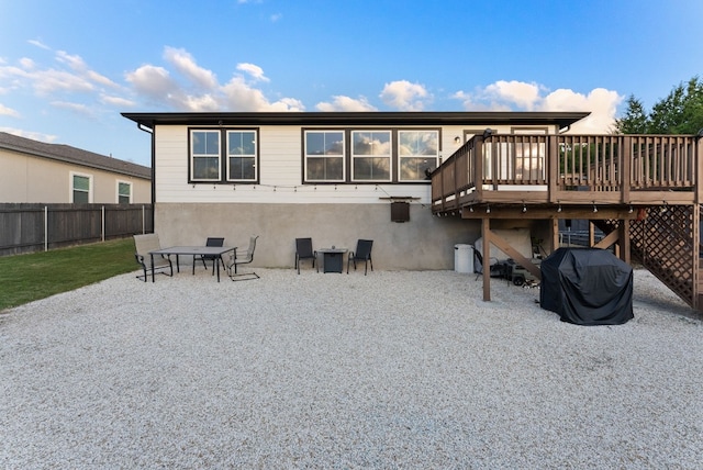 rear view of house with a patio area and a deck