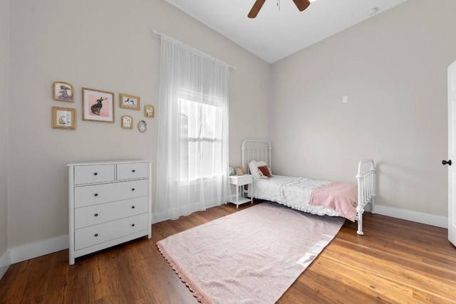 bedroom featuring ceiling fan and hardwood / wood-style floors