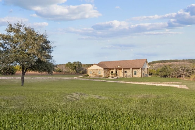 ranch-style house with a front lawn