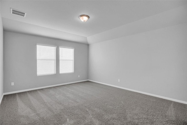 spare room with carpet