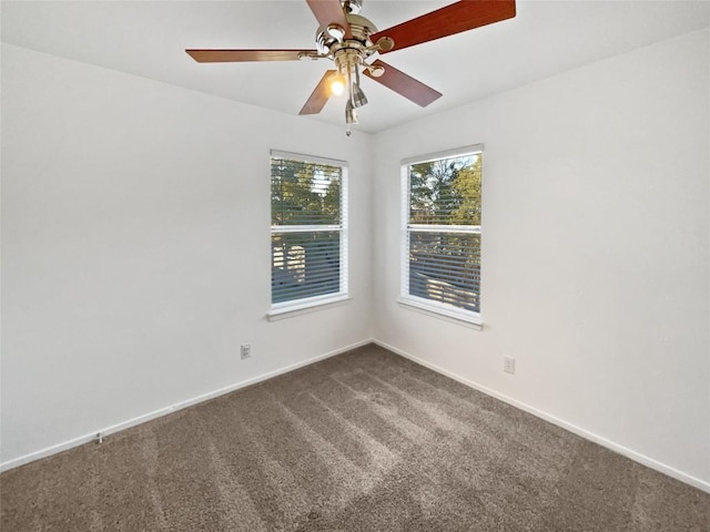 unfurnished room with carpet and ceiling fan