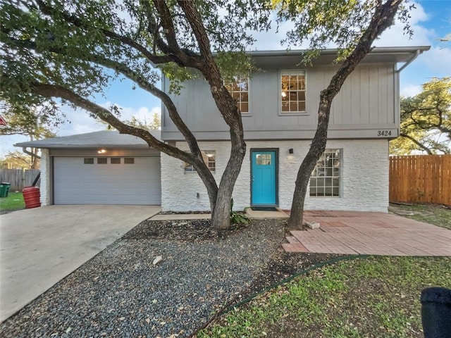 view of front of property featuring a garage