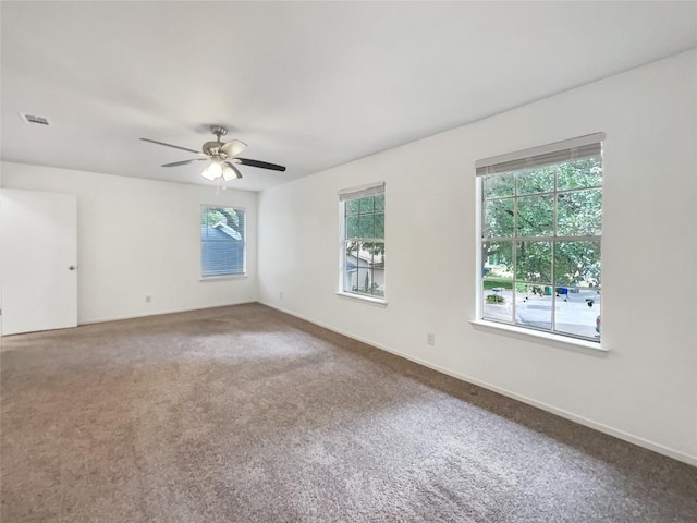 3424 Clarksburg Dr, Austin, TX 78745 - spare room featuring carpet floors and a ceiling fan