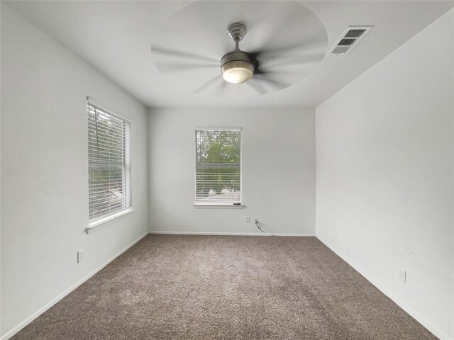 3424 Clarksburg Dr, Austin, TX 78745 - carpeted spare room with ceiling fan and baseboards