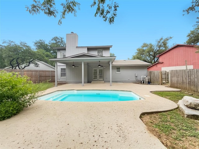 3424 Clarksburg Dr, Austin, TX 78745 - rear view of house featuring ceiling fan, a patio, a fenced backyard, a chimney, and french doors