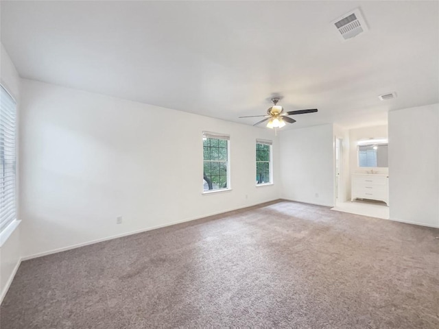 3424 Clarksburg Dr, Austin, TX 78745 - carpeted empty room featuring a ceiling fan and baseboards