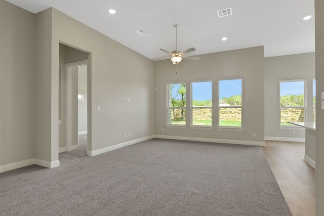 unfurnished room with recessed lighting, visible vents, baseboards, and a ceiling fan