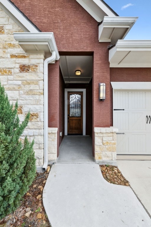 property entrance featuring a garage