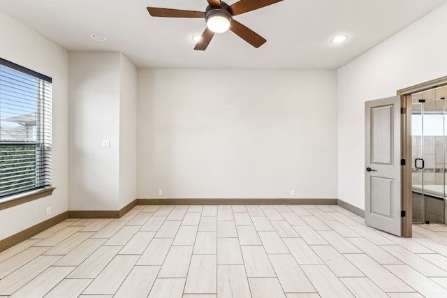 unfurnished room with ceiling fan