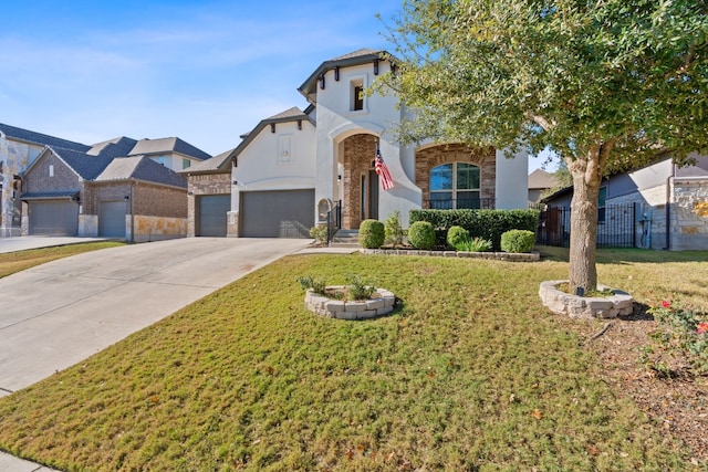 view of front of home featuring a garage and a front lawn