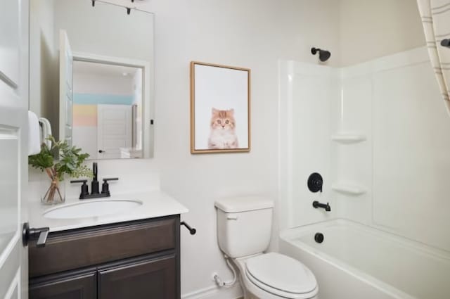 full bathroom with bathing tub / shower combination, vanity, and toilet