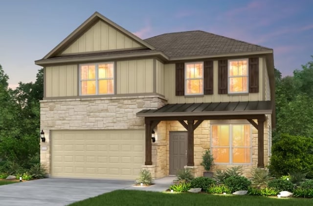 view of front of home with a garage